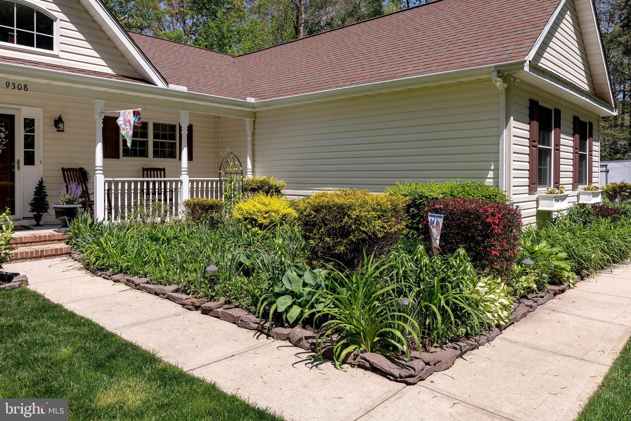 9308 Benson Road Lincoln, DE 19960 - Photo 4 of 59 Enjoy your gardens from the front porch