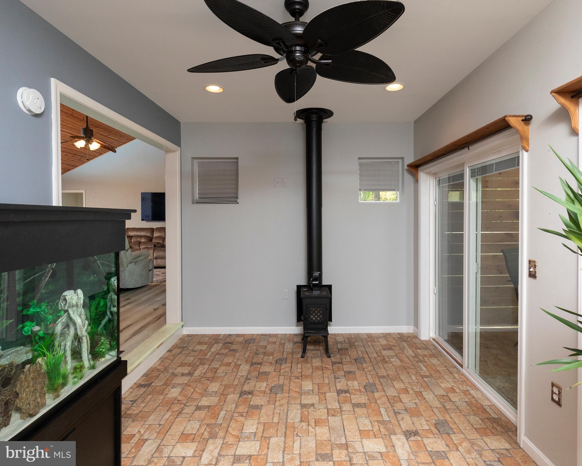9308 Benson Road Lincoln, DE 19960 - Photo 50 of 59 Tiled Floor Sun-room