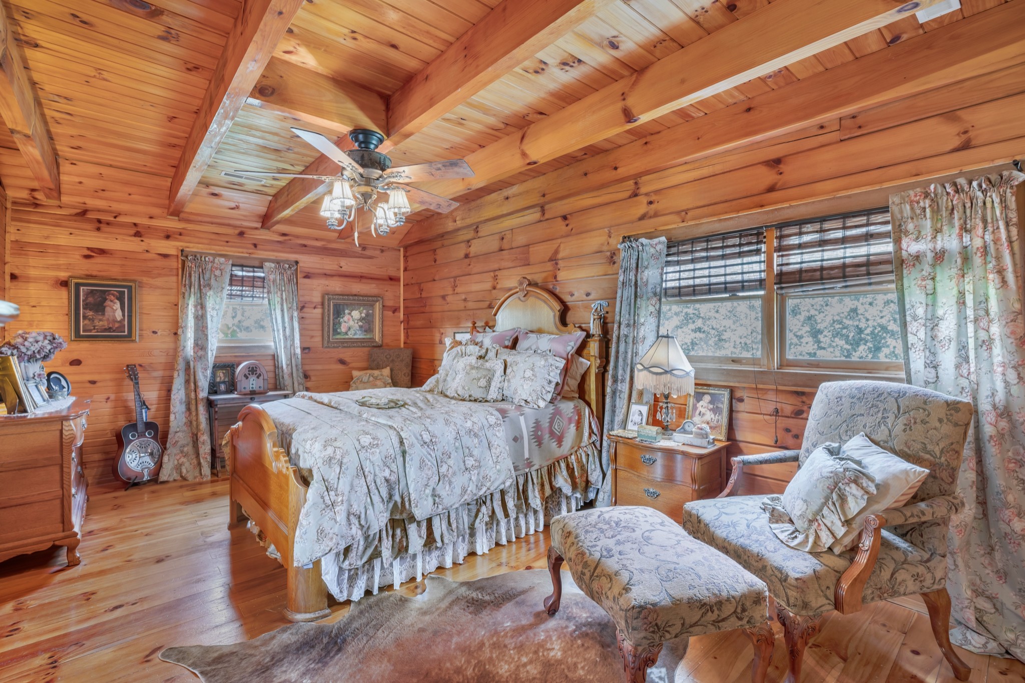 7997 Shoals Branch Road Primm Springs, TN 38476 - Photo 28 of 50 a bedroom with furniture and wooden floor