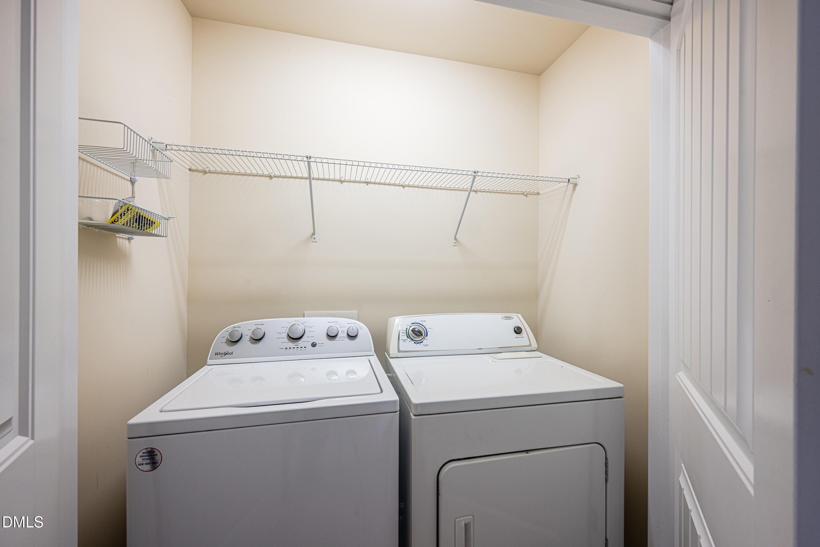 1260 Silver Beach Way Raleigh, NC 27606 - Photo 18 of 24 a utility room with dryer and washer