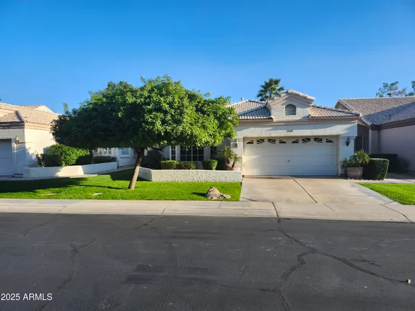 a view of house with outdoor space and porch