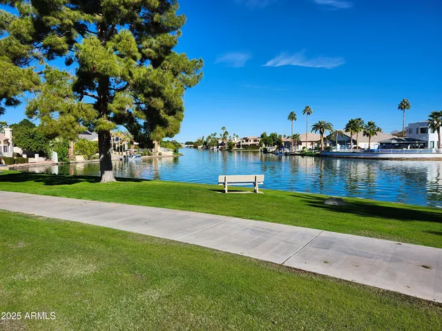 a view of a lake with a big yard