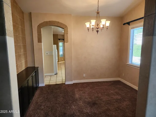 a view of a livingroom with a chandelier