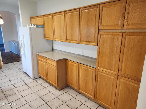 a view of a refrigerator and window