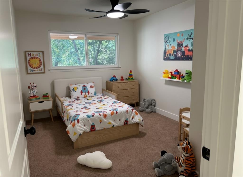 424 Valley Park Drive Garland, TX 75043 - Photo 13 of 18 a bedroom with a bed and a window