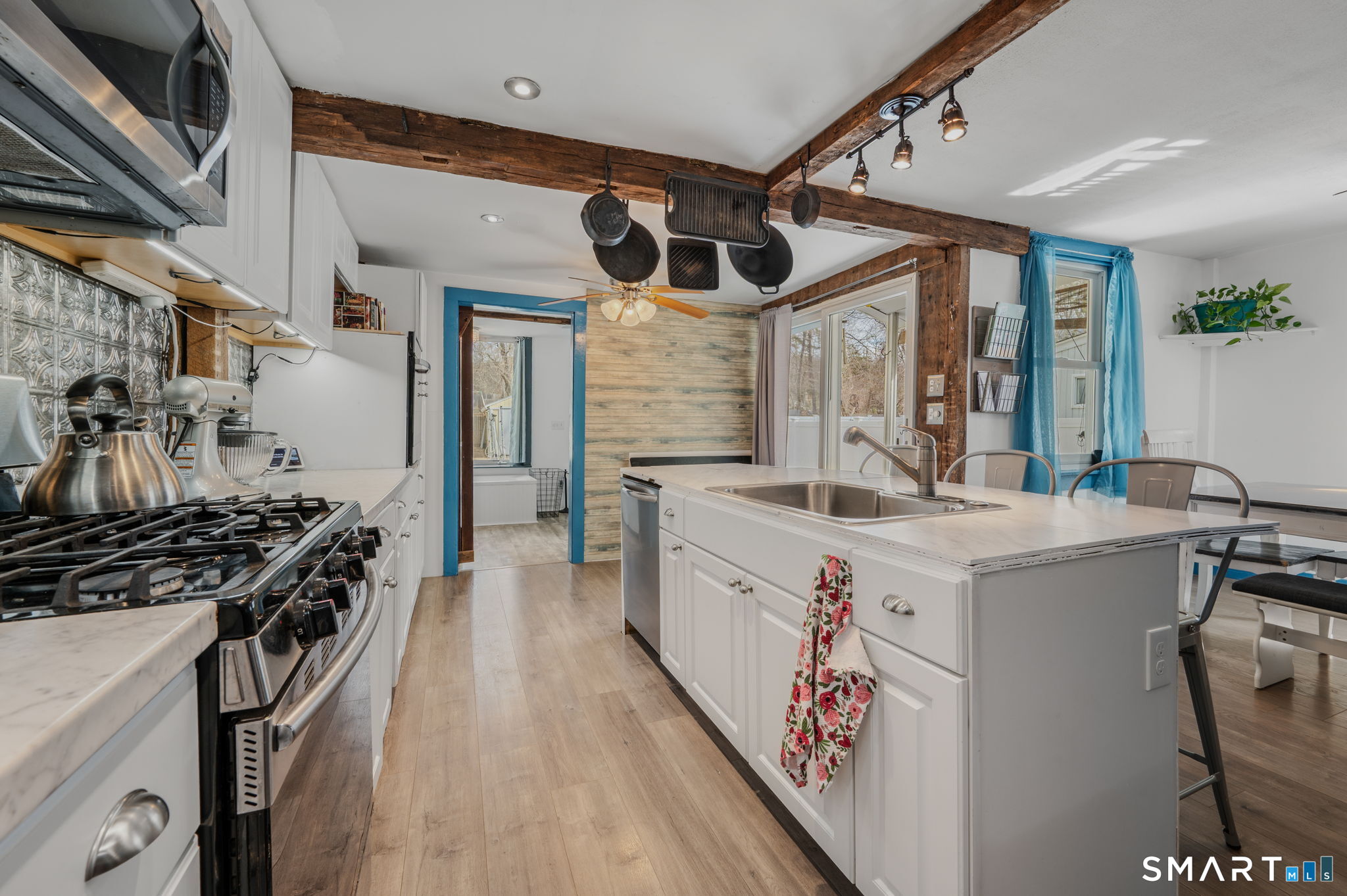118 Highway 2A Preston, CT 06365 - Photo 11 of 31 a kitchen with a stove and a microwave
