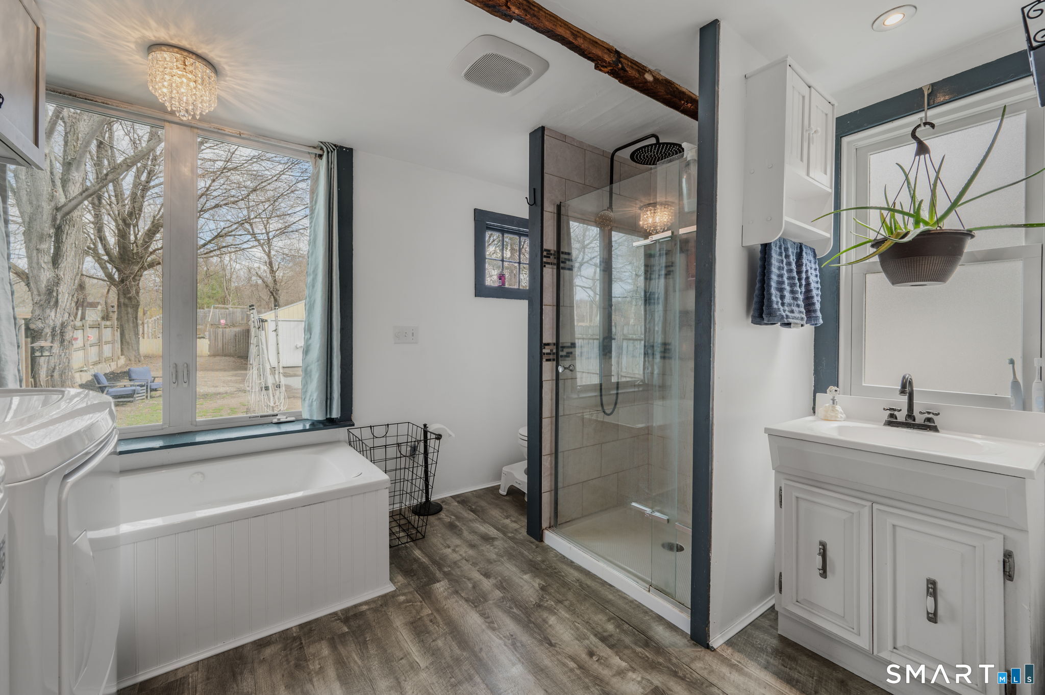118 Highway 2A Preston, CT 06365 - Photo 15 of 31 a bathroom with a tub sink toilet and mirror