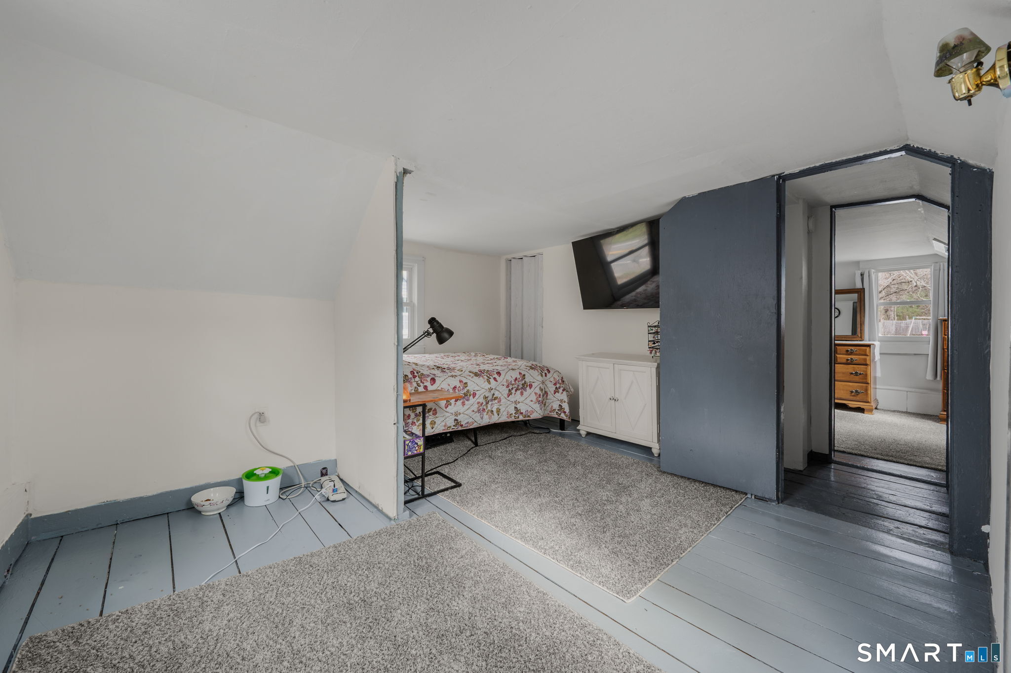 118 Highway 2A Preston, CT 06365 - Photo 16 of 31 a bedroom with a bed and a tv on table