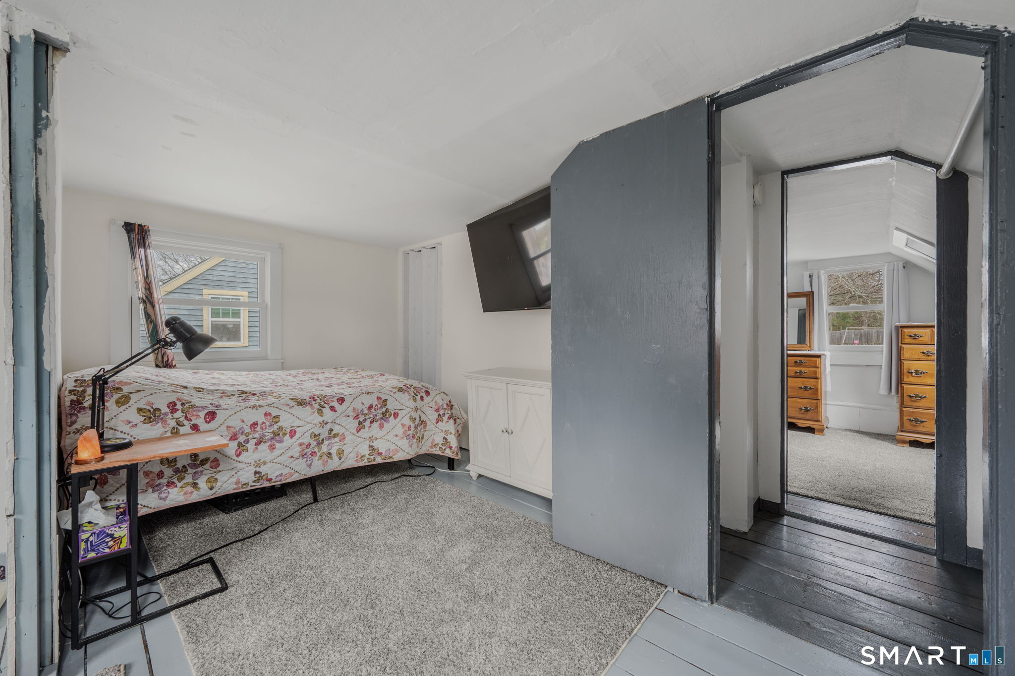 118 Highway 2A Preston, CT 06365 - Photo 18 of 31 a bedroom with a bed and a mirror