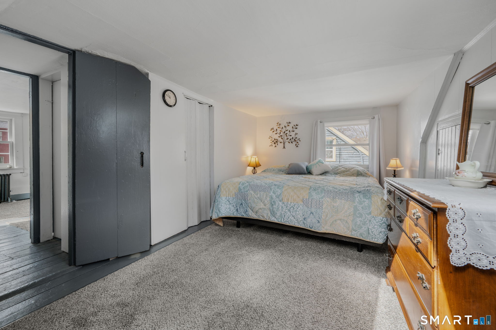 118 Highway 2A Preston, CT 06365 - Photo 19 of 31 a bedroom with a bed and a dresser