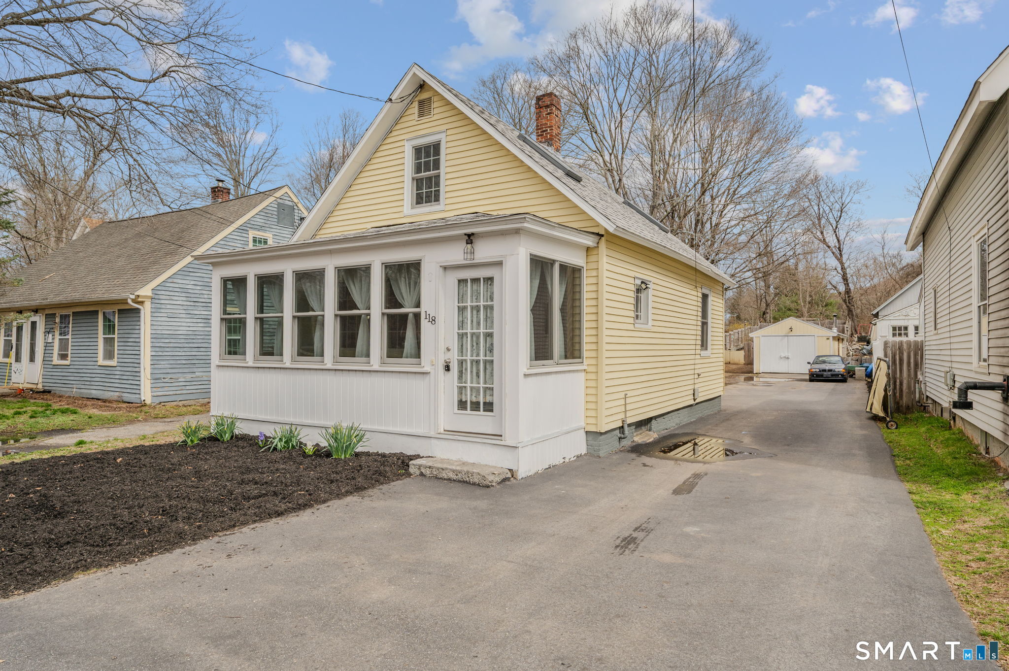 118 Highway 2A Preston, CT 06365 - Photo 2 of 31 a view of a white house with a large space next to a yard