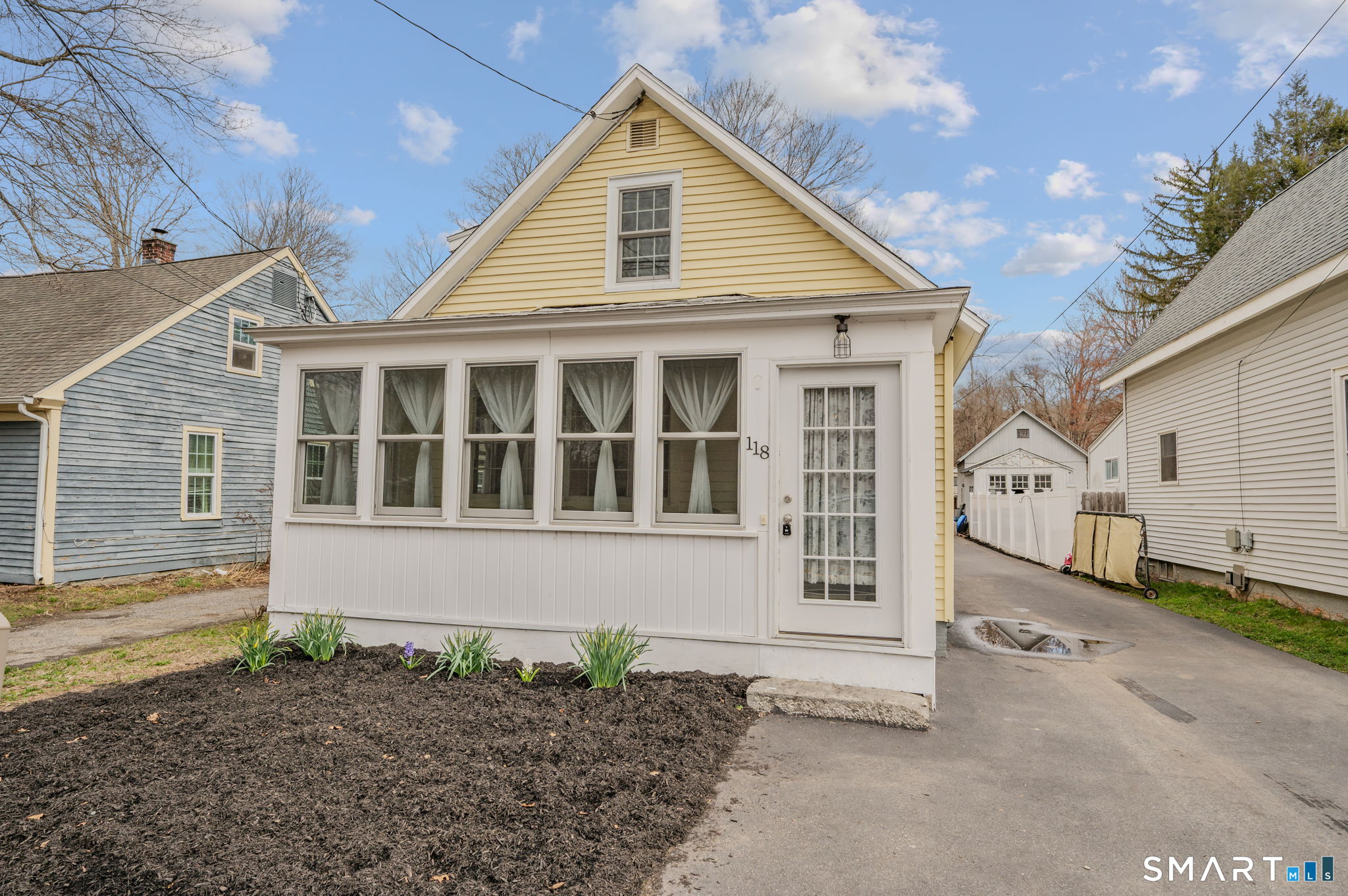 118 Highway 2A Preston, CT 06365 - Photo 3 of 31 a front view of a house with a yard