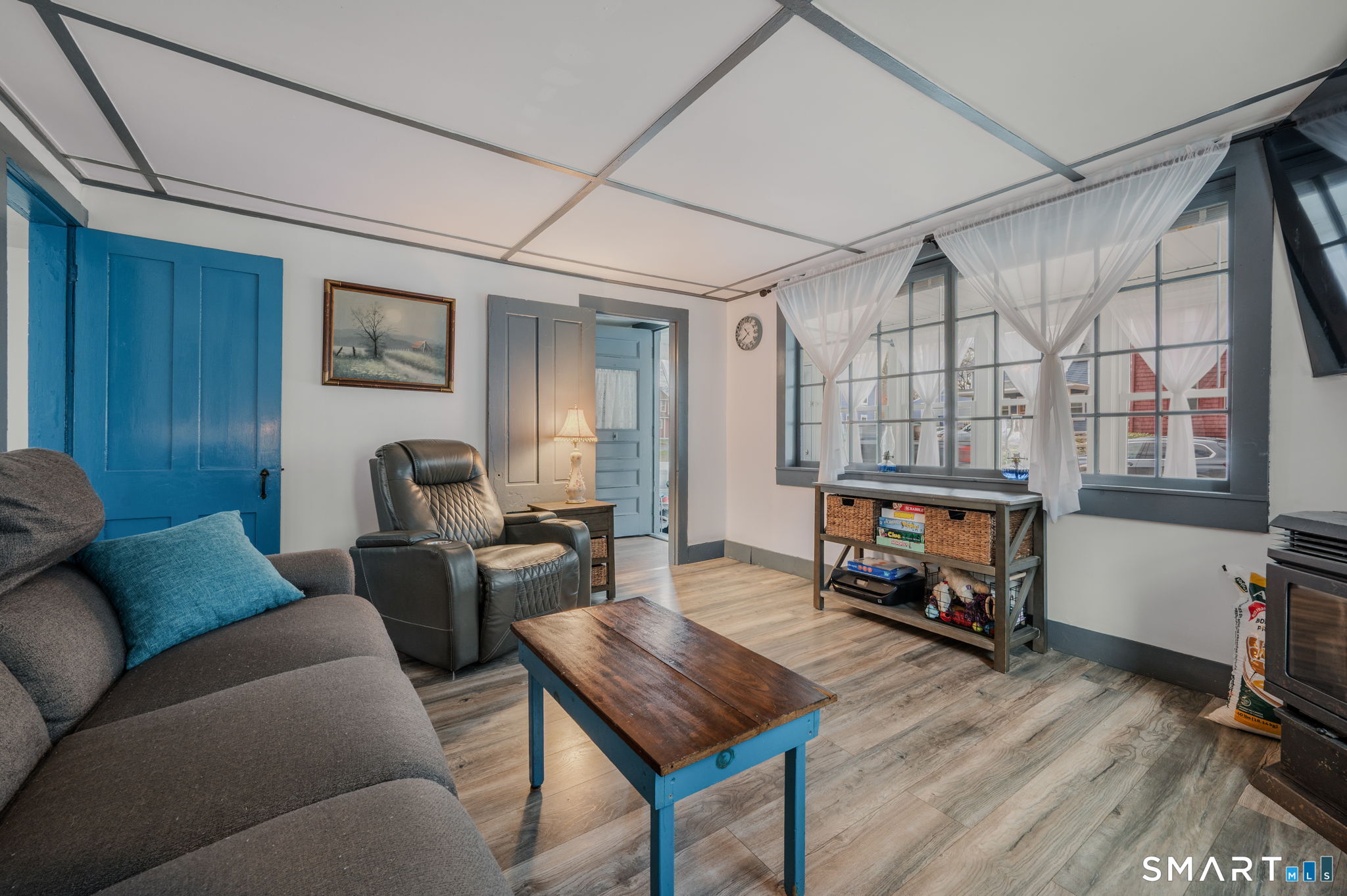 118 Highway 2A Preston, CT 06365 - Photo 6 of 31 a living room with furniture a couch and a window