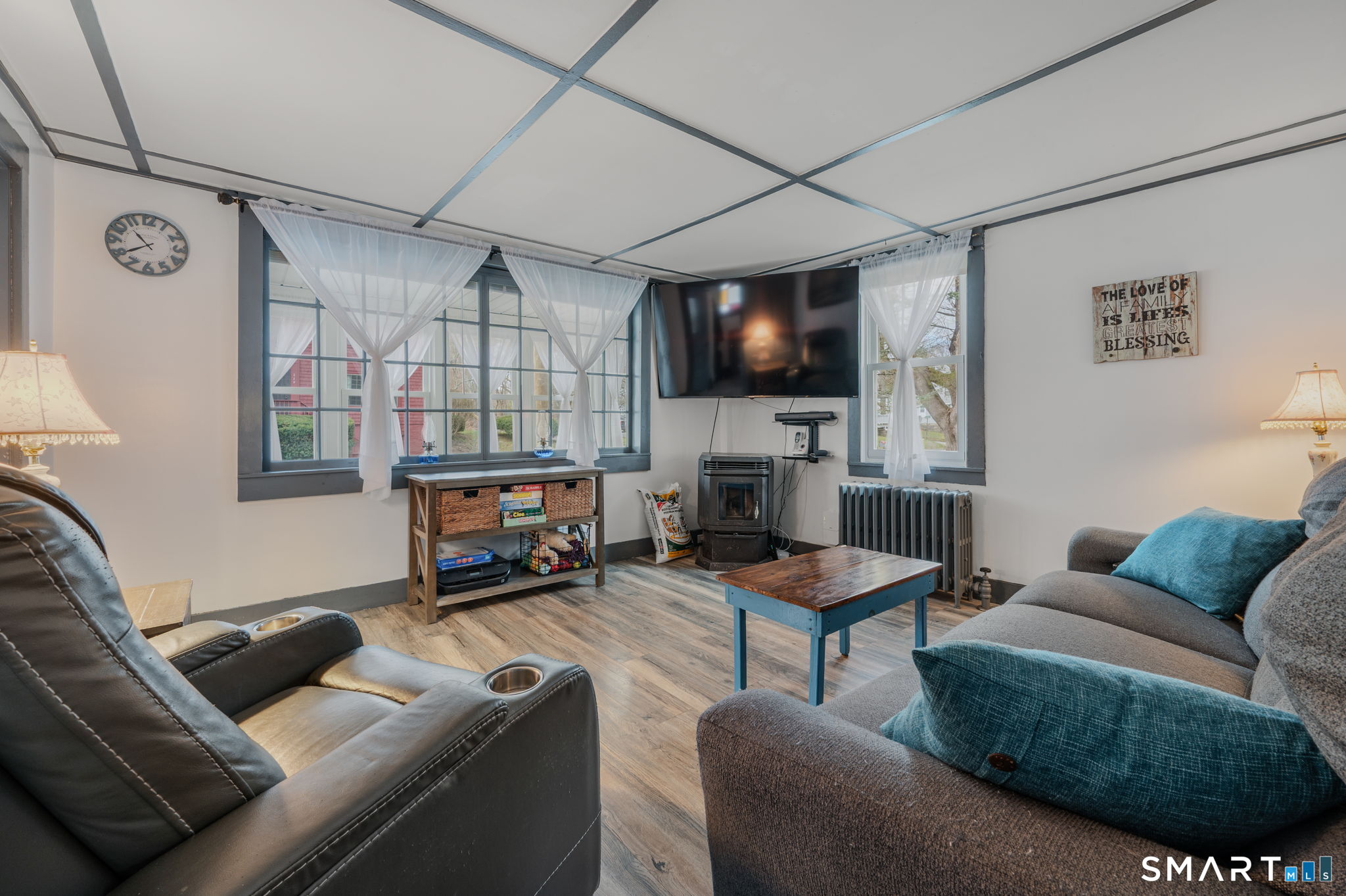 118 Highway 2A Preston, CT 06365 - Photo 7 of 31 a living room with furniture and a flat screen tv