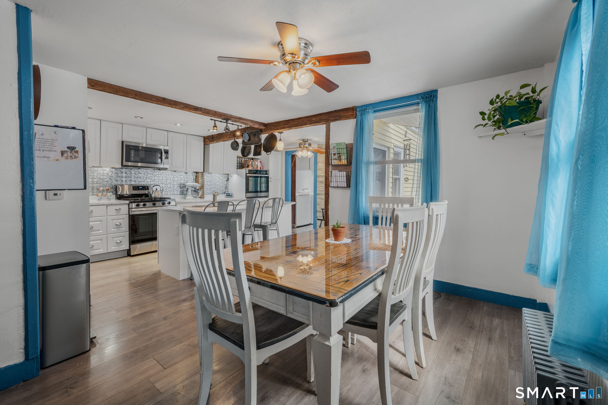 118 Highway 2A Preston, CT 06365 - Photo 8 of 31 a view of a dining room with furniture window and wooden floor