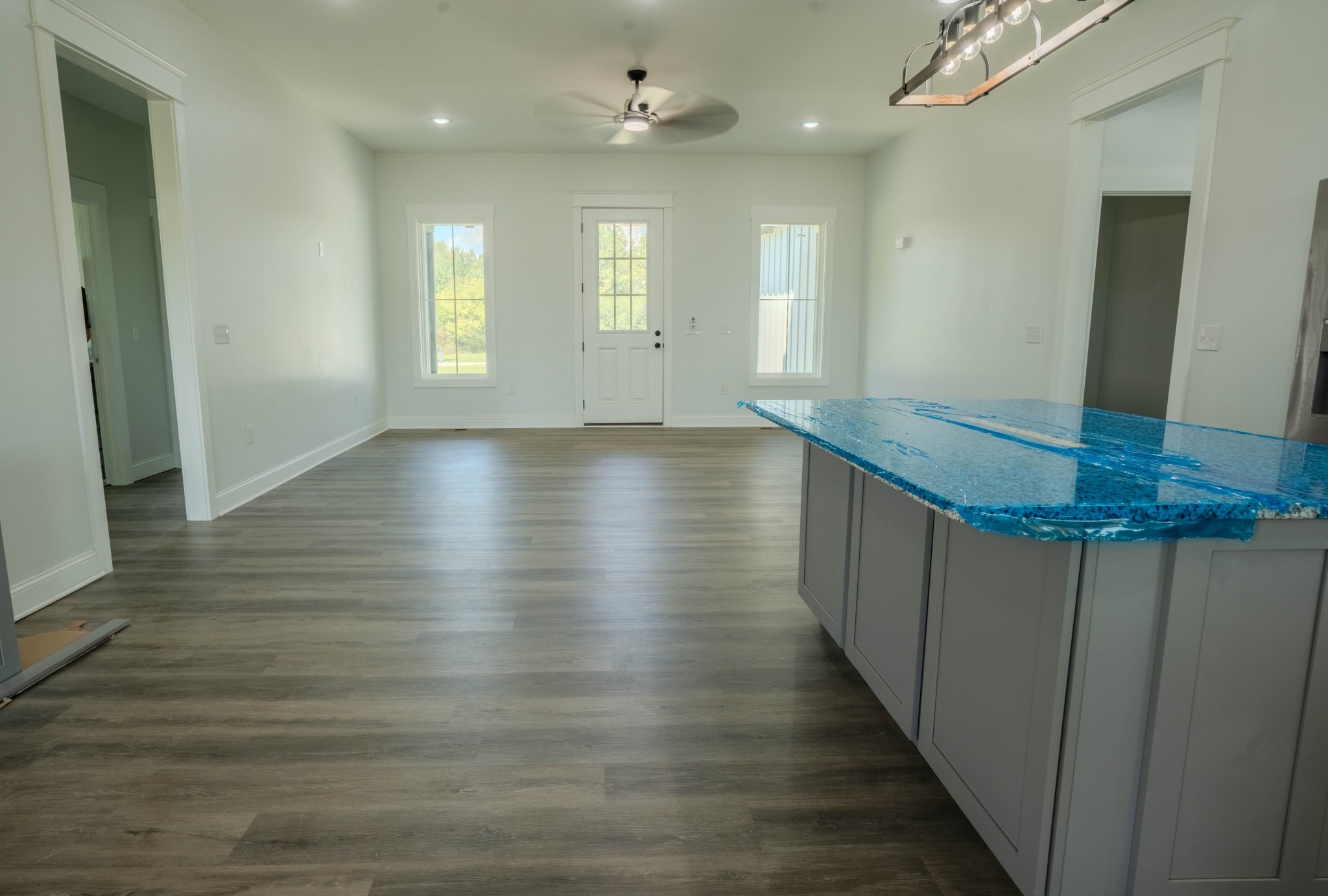 176 Beartown Road Loretto, TN 38469 - Photo 13 of 46 a view of a room with wooden floor and staircase