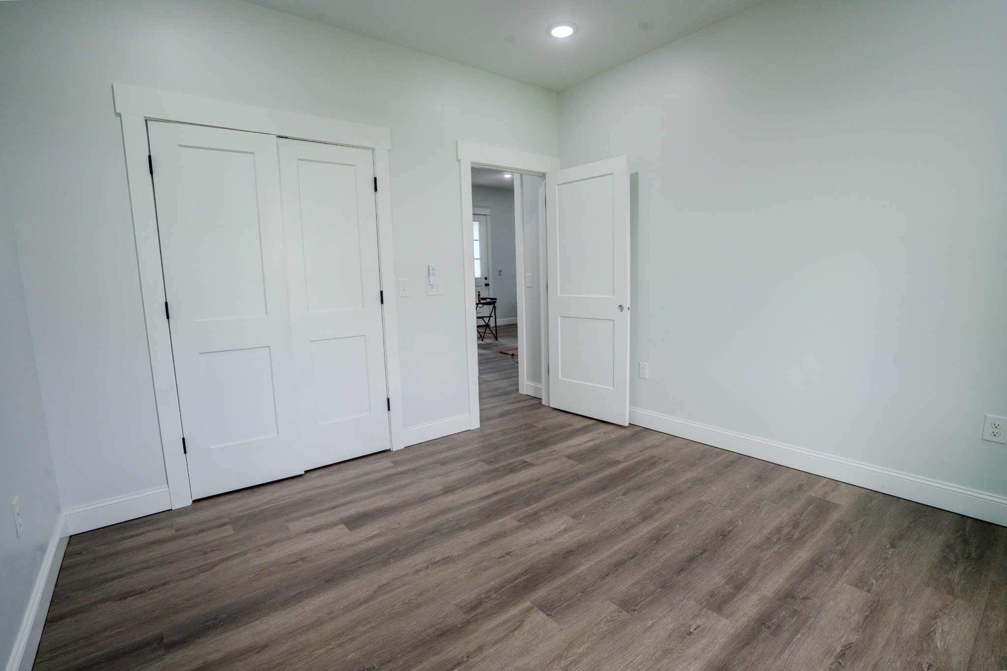 176 Beartown Road Loretto, TN 38469 - Photo 20 of 46 a view of an empty room with wooden floor