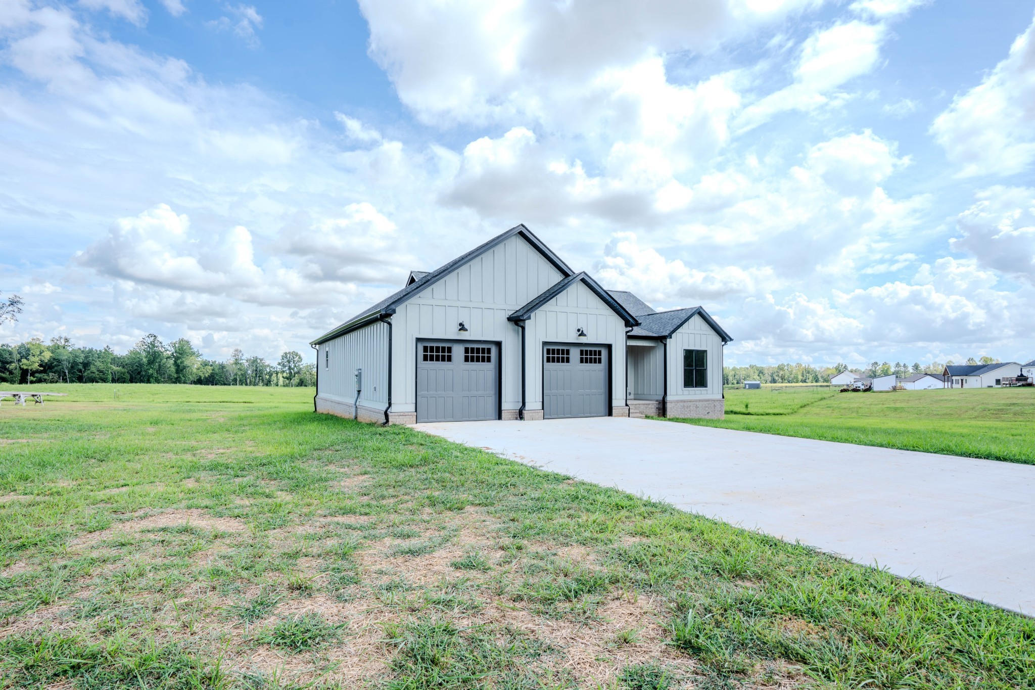 176 Beartown Road Loretto, TN 38469 - Photo 2 of 46 a front view of a house with yard