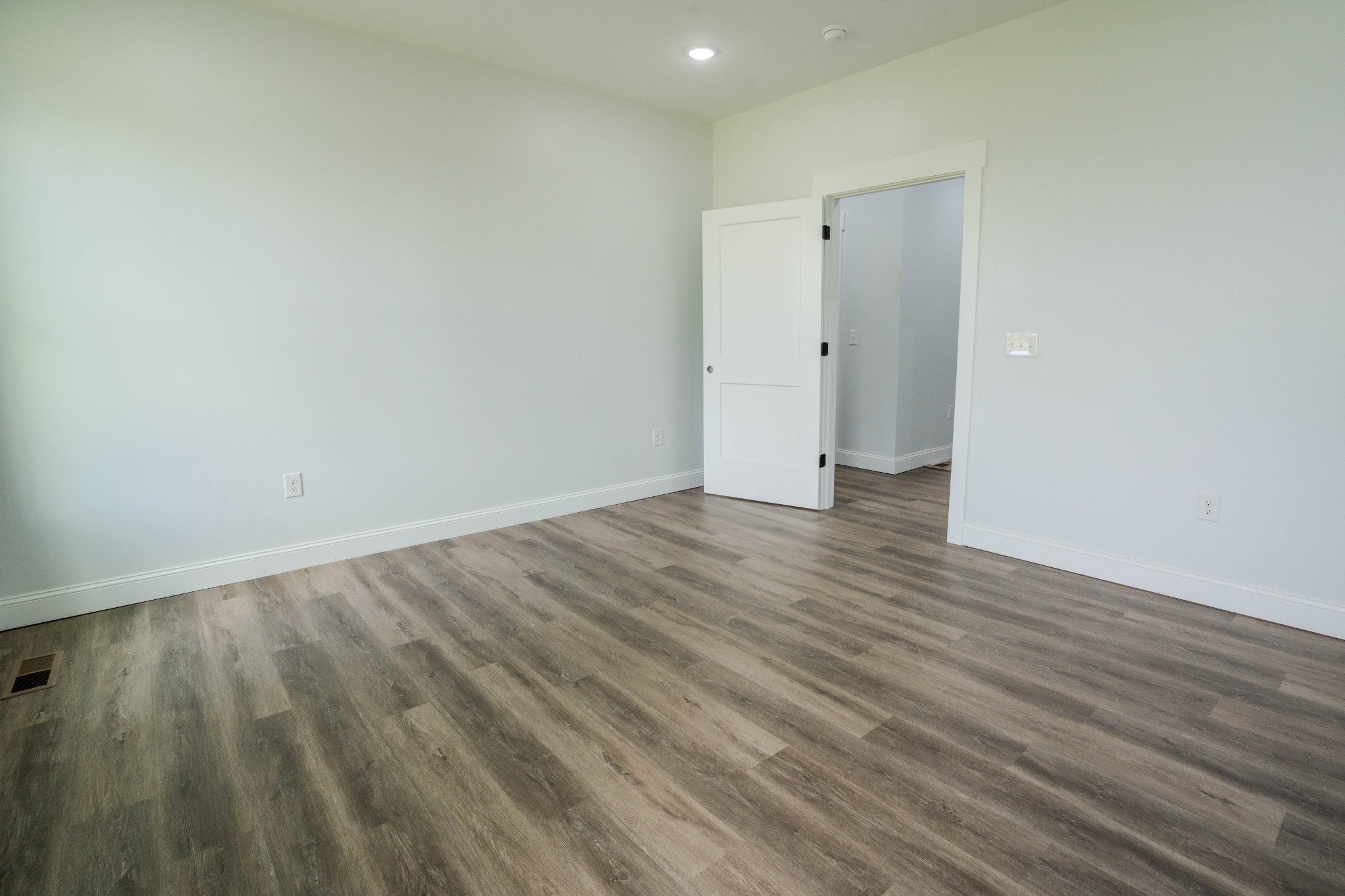 176 Beartown Road Loretto, TN 38469 - Photo 28 of 46 a view of an empty room with wooden floor
