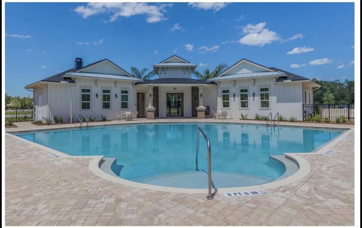 32 Del Mar Circle St. Augustine, FL 32086 - Photo 14 of 21 a view of a house with a swimming pool