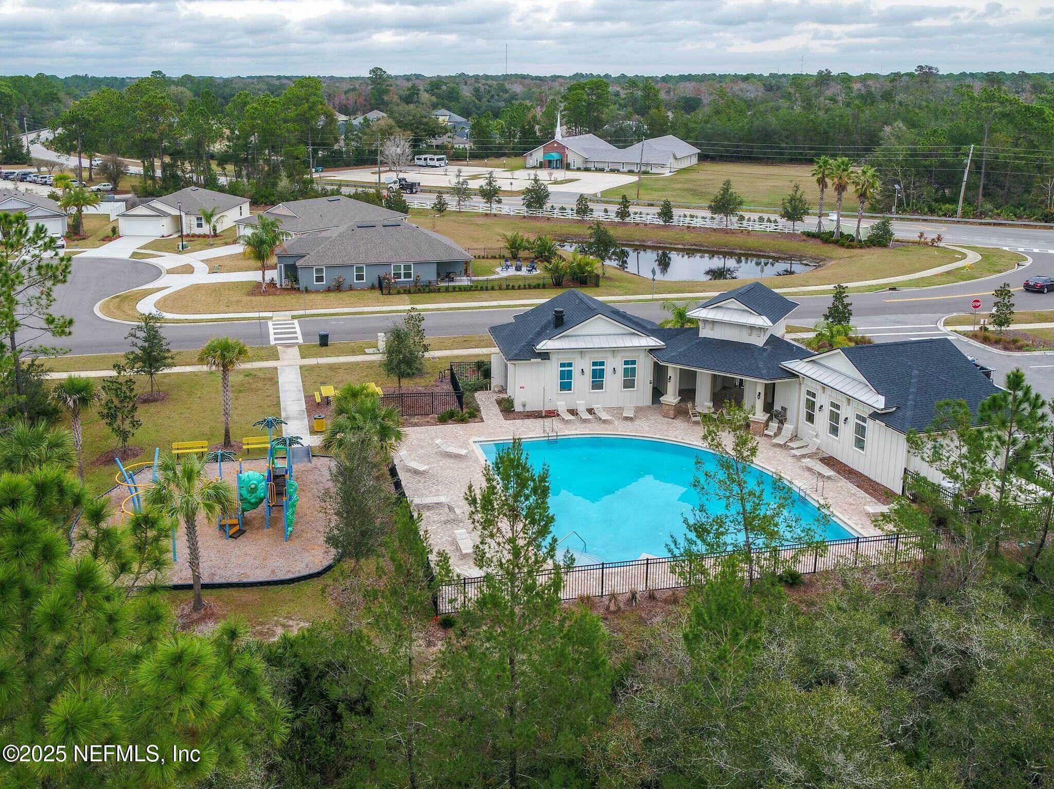 32 Del Mar Circle St. Augustine, FL 32086 - Photo 15 of 21 an aerial view of residential houses with outdoor space and swimming pool