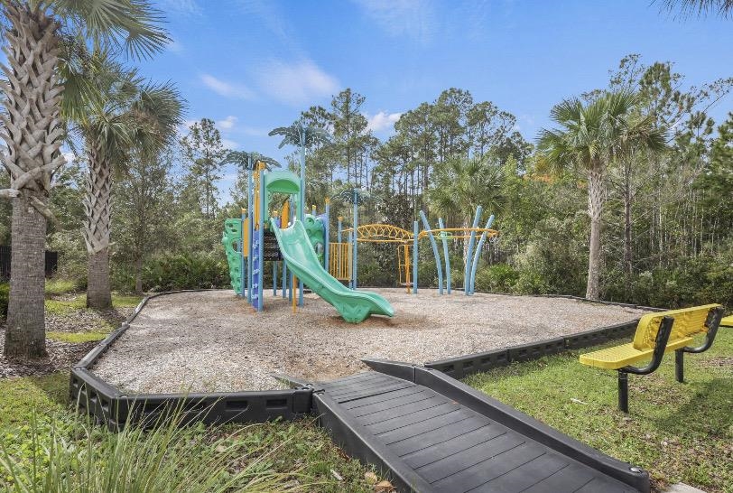 32 Del Mar Circle St. Augustine, FL 32086 - Photo 20 of 21 a view of a wooden deck with a house