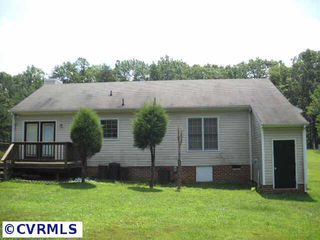 1960 Maidens Road Maidens, VA 23102 - Photo 2 of 5 front view of a house with a yard