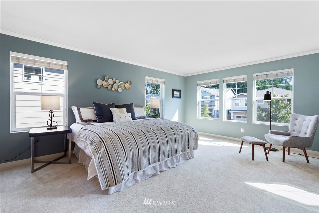 22832 36th Drive Southeast Bothell, WA 98021 - Photo 14 of 26 a bedroom with a bed and a desk