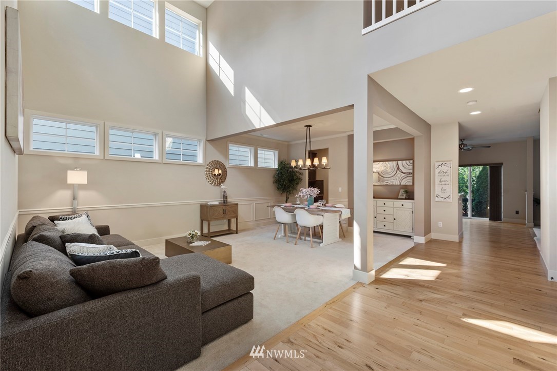 22832 36th Drive Southeast Bothell, WA 98021 - Photo 3 of 26 a living room with furniture and large windows