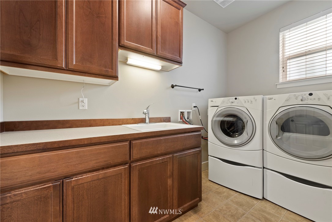 22832 36th Drive Southeast Bothell, WA 98021 - Photo 23 of 26 a utility room with dryer and washer