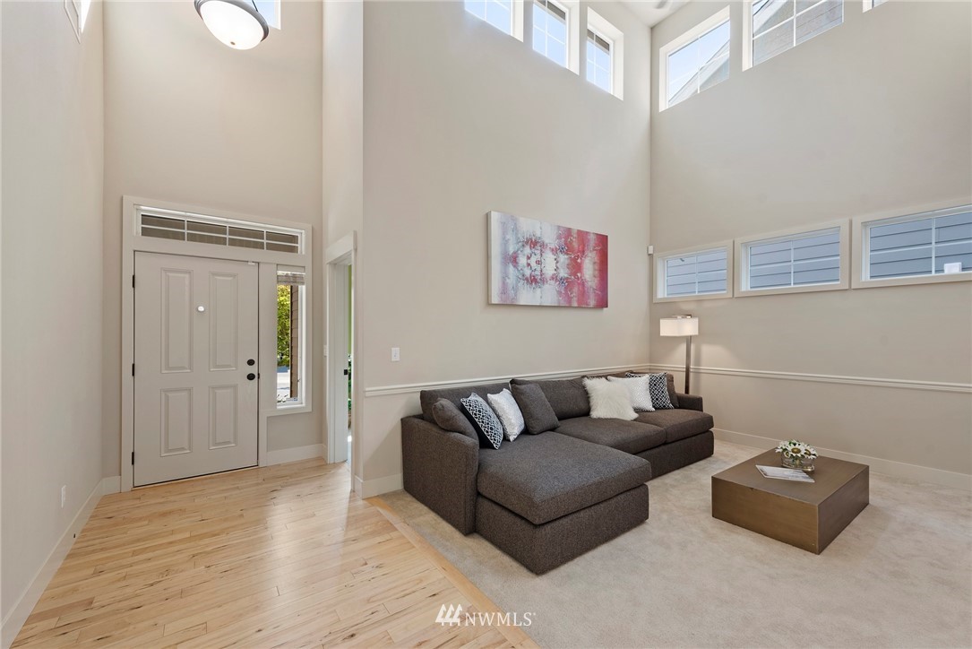 22832 36th Drive Southeast Bothell, WA 98021 - Photo 4 of 26 a living room with furniture and a wooden floor