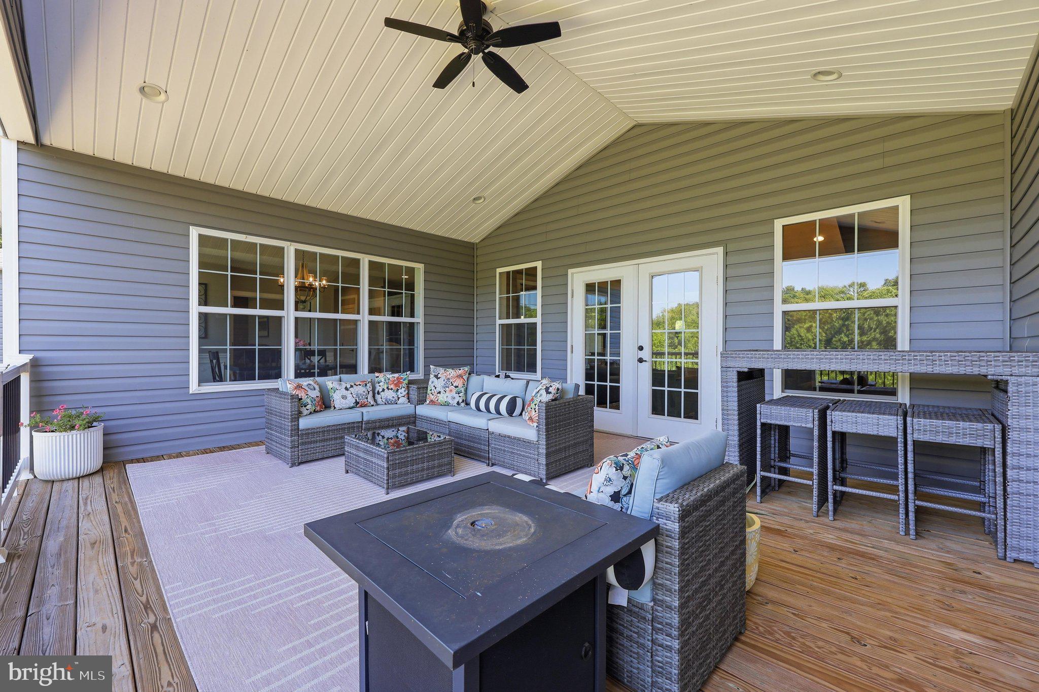 8225 Ball Road Frederick, MD 21704 - Photo 20 of 51 Covered porch looks over the backyard