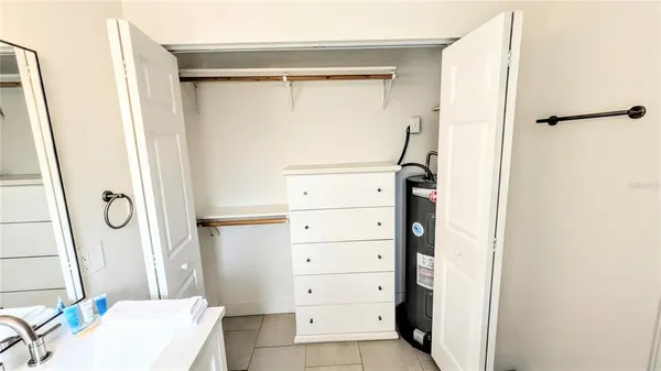 a close view of shoes stand and cabinets