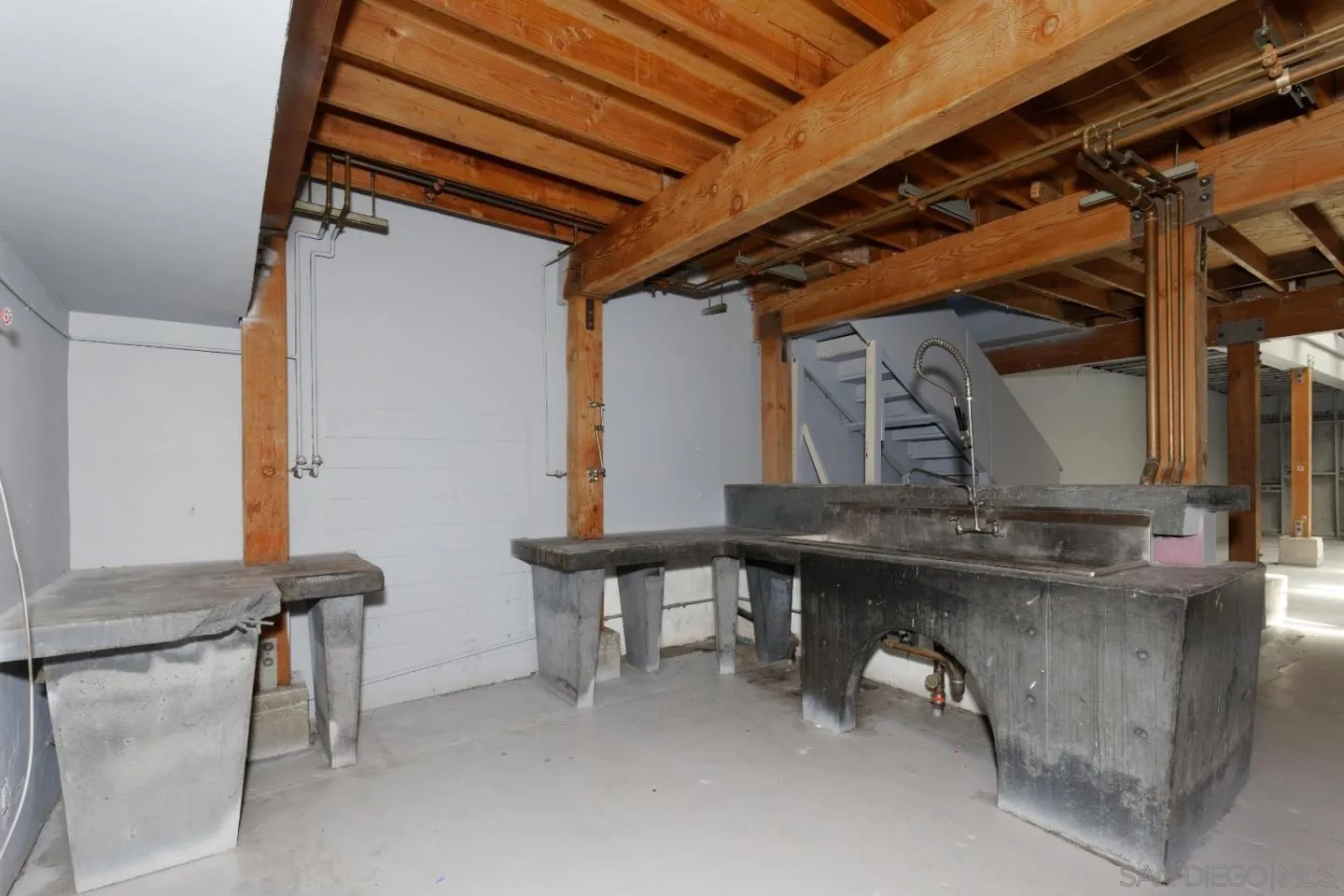 1038 24th Street Oakland, CA 94607 - Photo 8 of 17 a room with a table and chairs