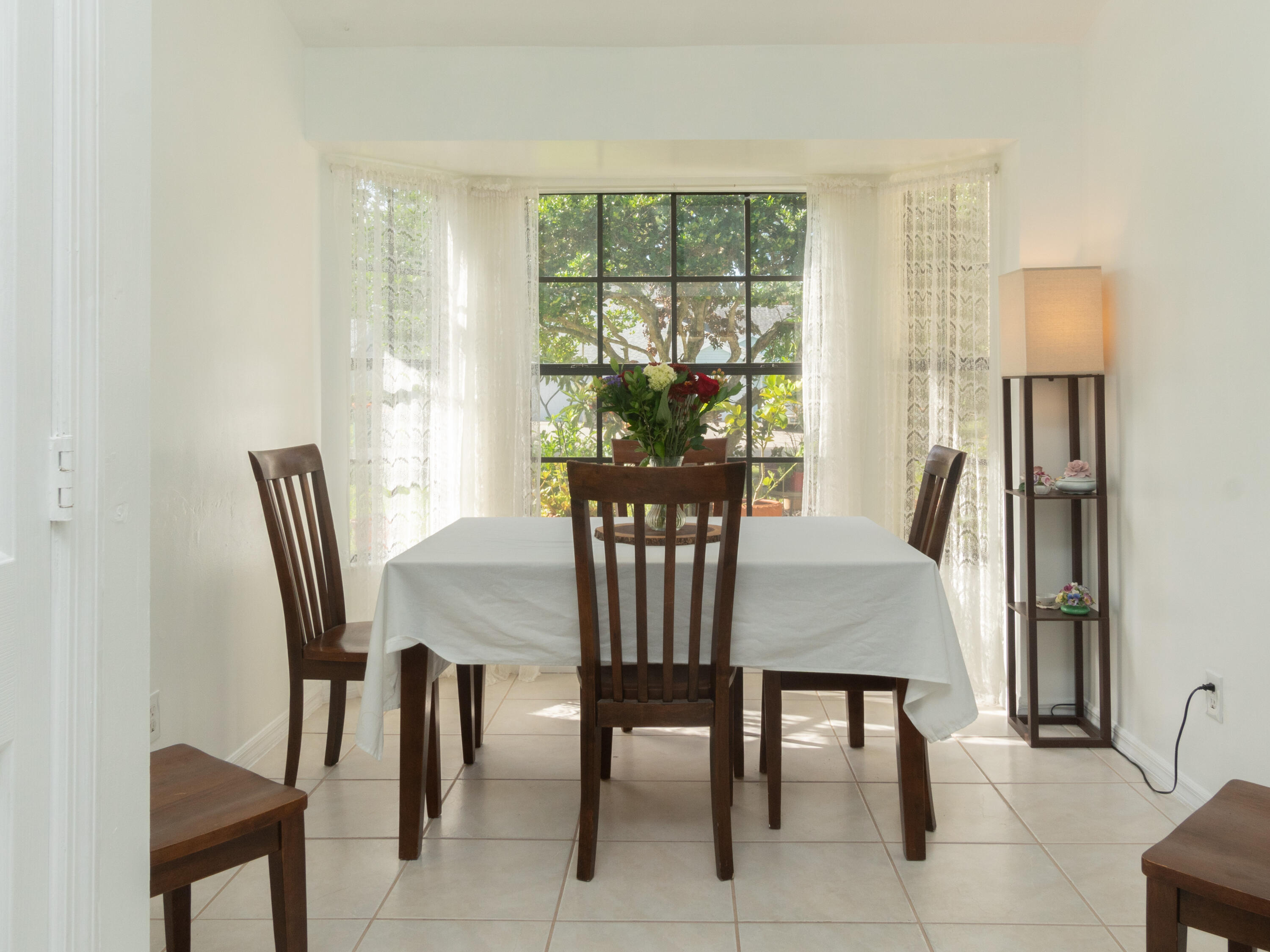 1404 Monarch Naples, FL 34116 - Photo 16 of 33 a view of a dining room with furniture window and outside view