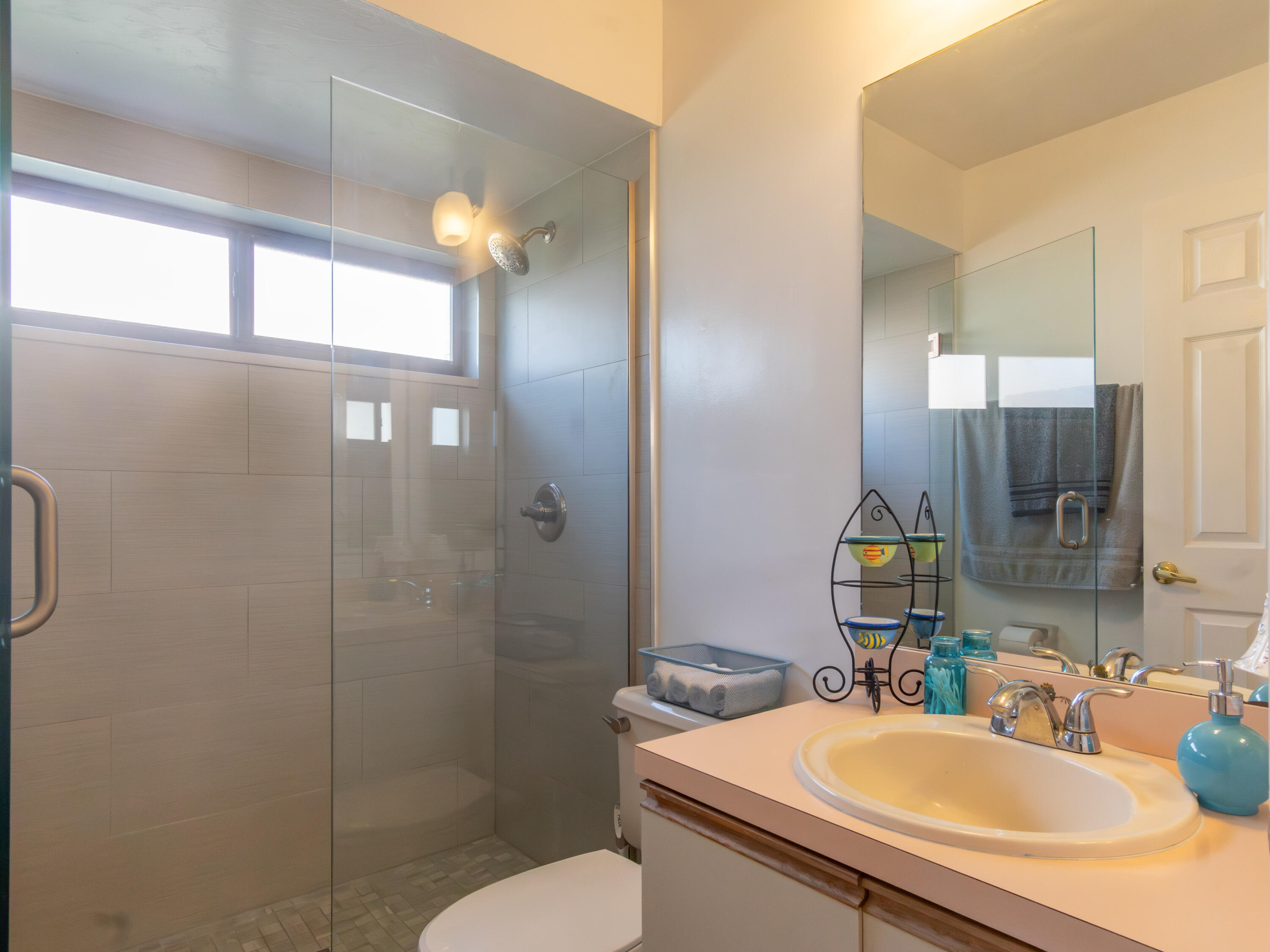 1404 Monarch Naples, FL 34116 - Photo 25 of 33 a bathroom with a sink toilet and shower