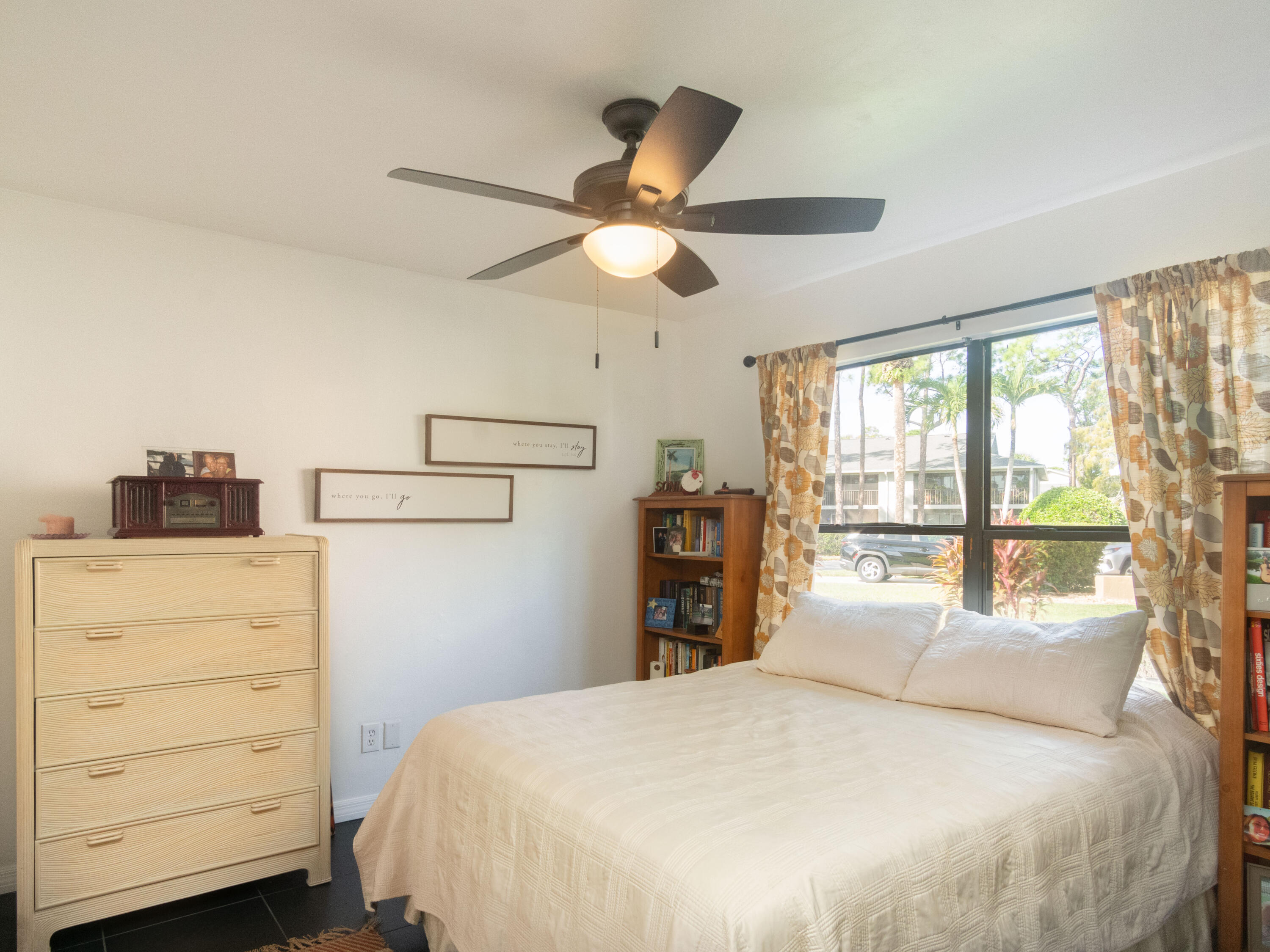 1404 Monarch Naples, FL 34116 - Photo 27 of 33 a bedroom with a bed and a large window