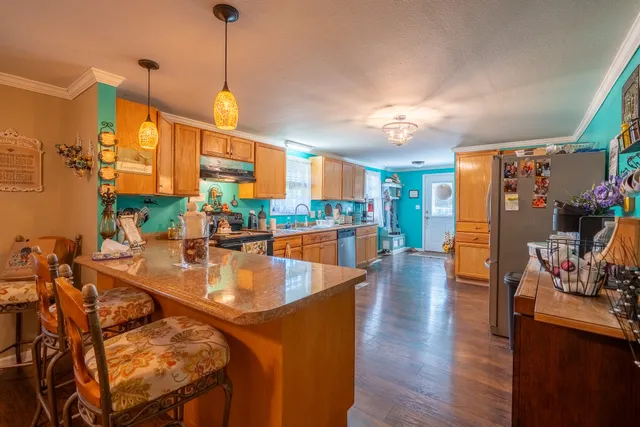 a view of a dining room with furniture