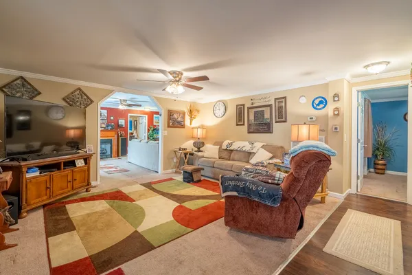 a bathroom with a sink toilet tub and shower