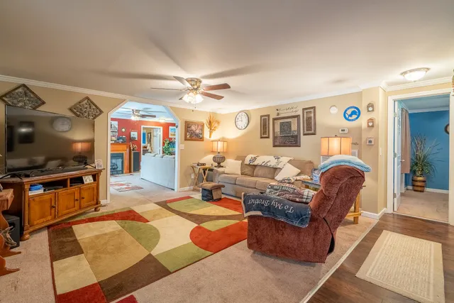 a bathroom with a sink toilet tub and shower