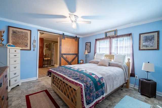 a bathroom with a sink toilet and mirror