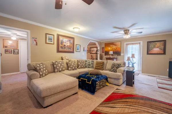 a bedroom with a bed and dresser