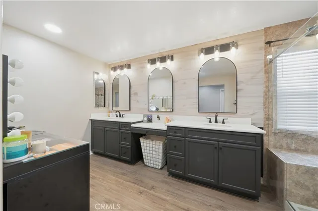 a bedroom with a bed and a desk