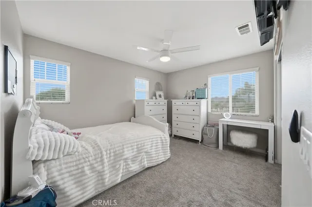 a bathroom with a double vanity sink mirror double and shower