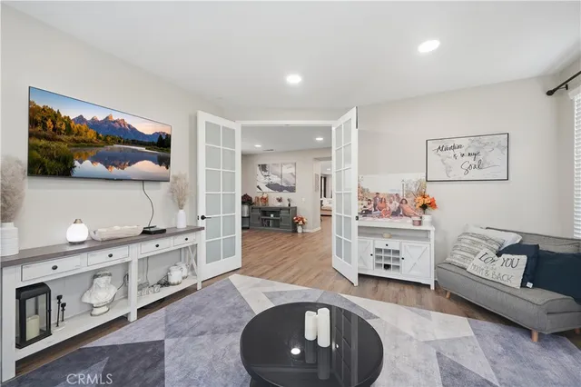 a living room with furniture and a table