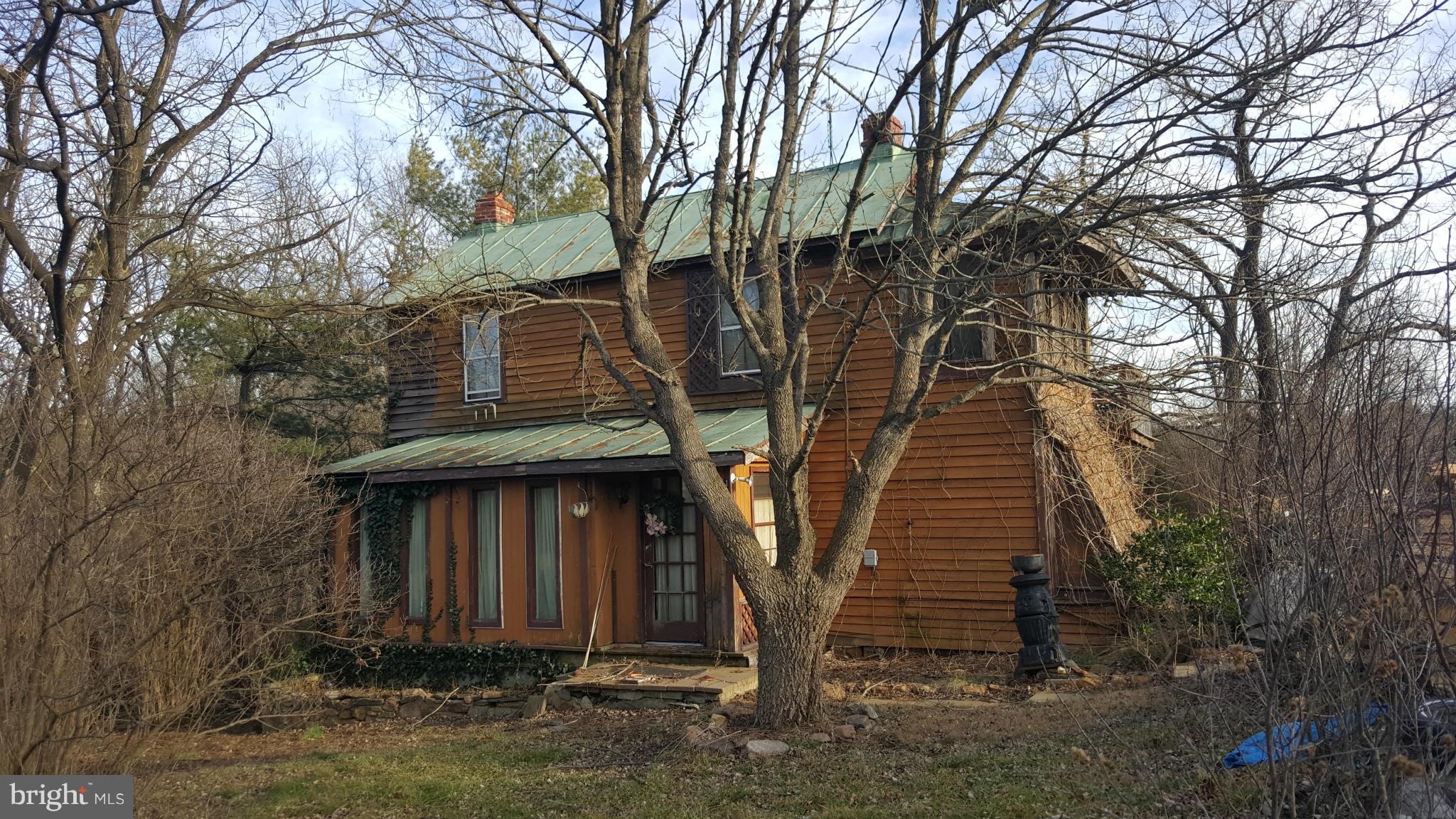 1563 South Pifer Road Star Tannery, VA 22654 - Photo 2 of 2 a view of a house with a yard