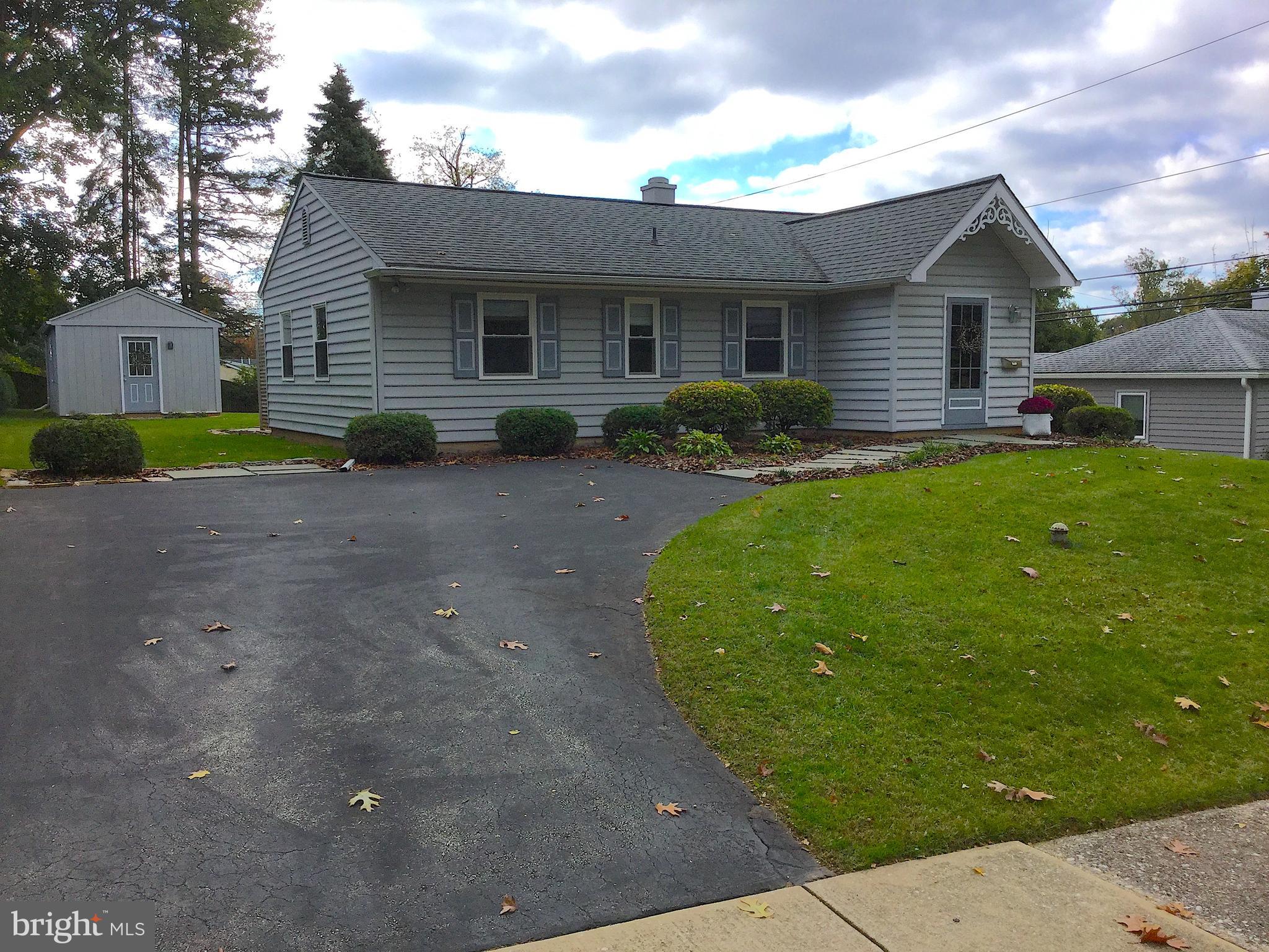 108 Lynbrook Road Paoli, PA 19301 - Photo 2 of 29 Paved driveway with off and on street parking