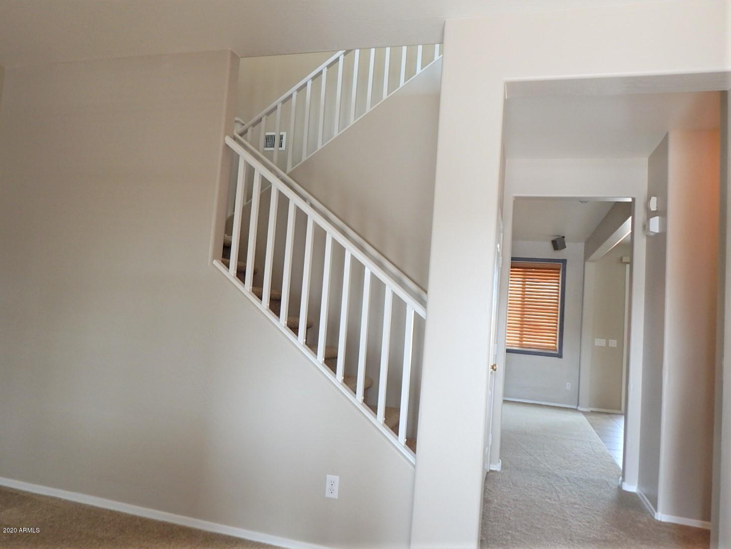 6908 West Darrel Road Laveen, AZ 85339 - Photo 3 of 33 Living Room Hallway