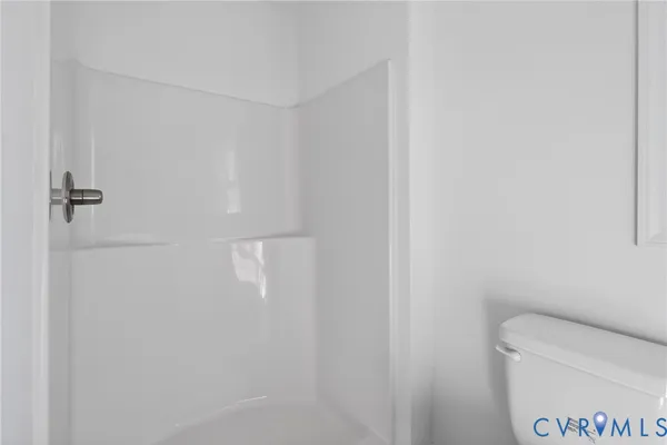 a bathroom with a granite countertop sink a mirror and a window
