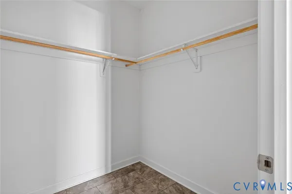 a bathroom with a bathtub and toilet